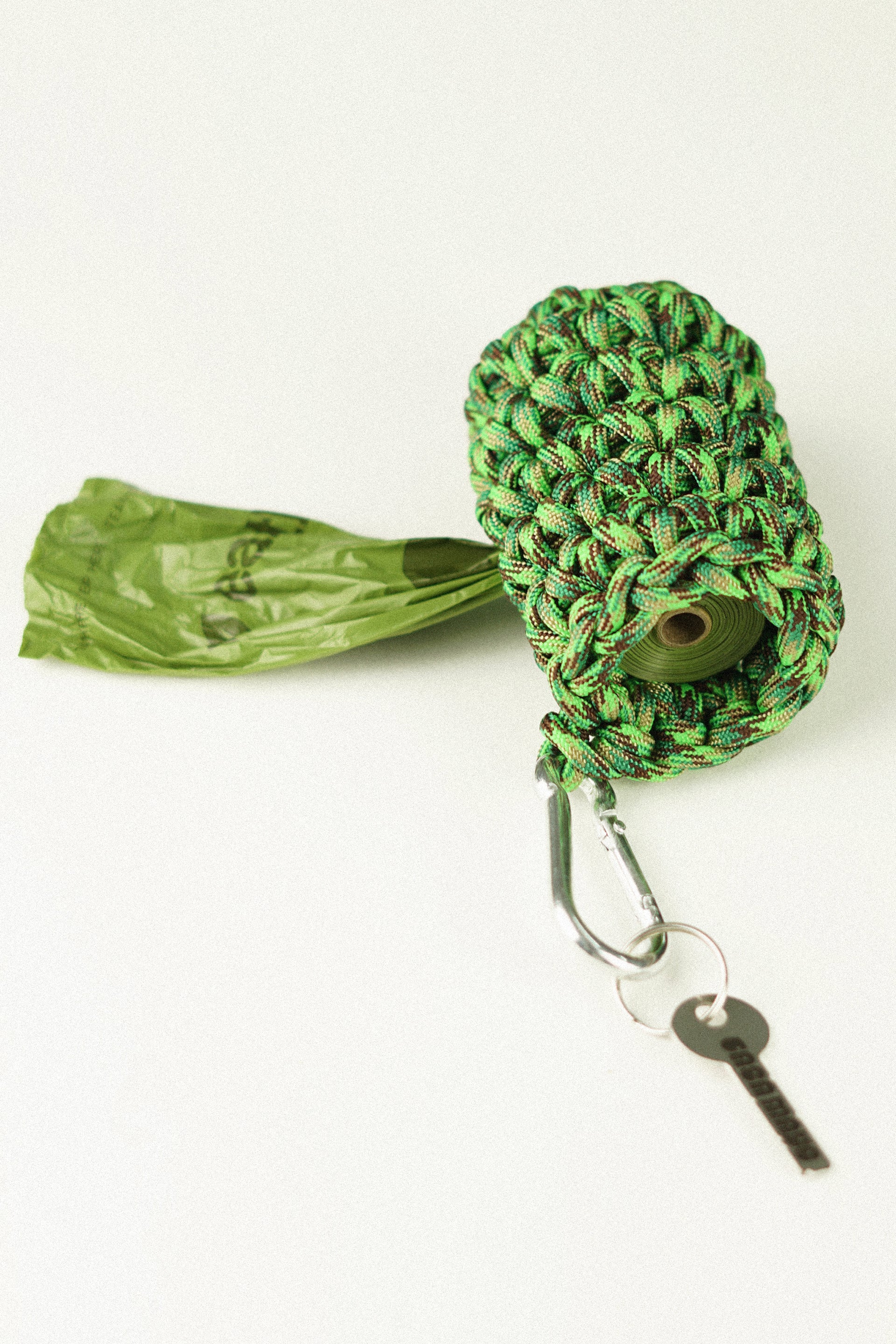 Camo coloured pet bag holder made of paracord rope