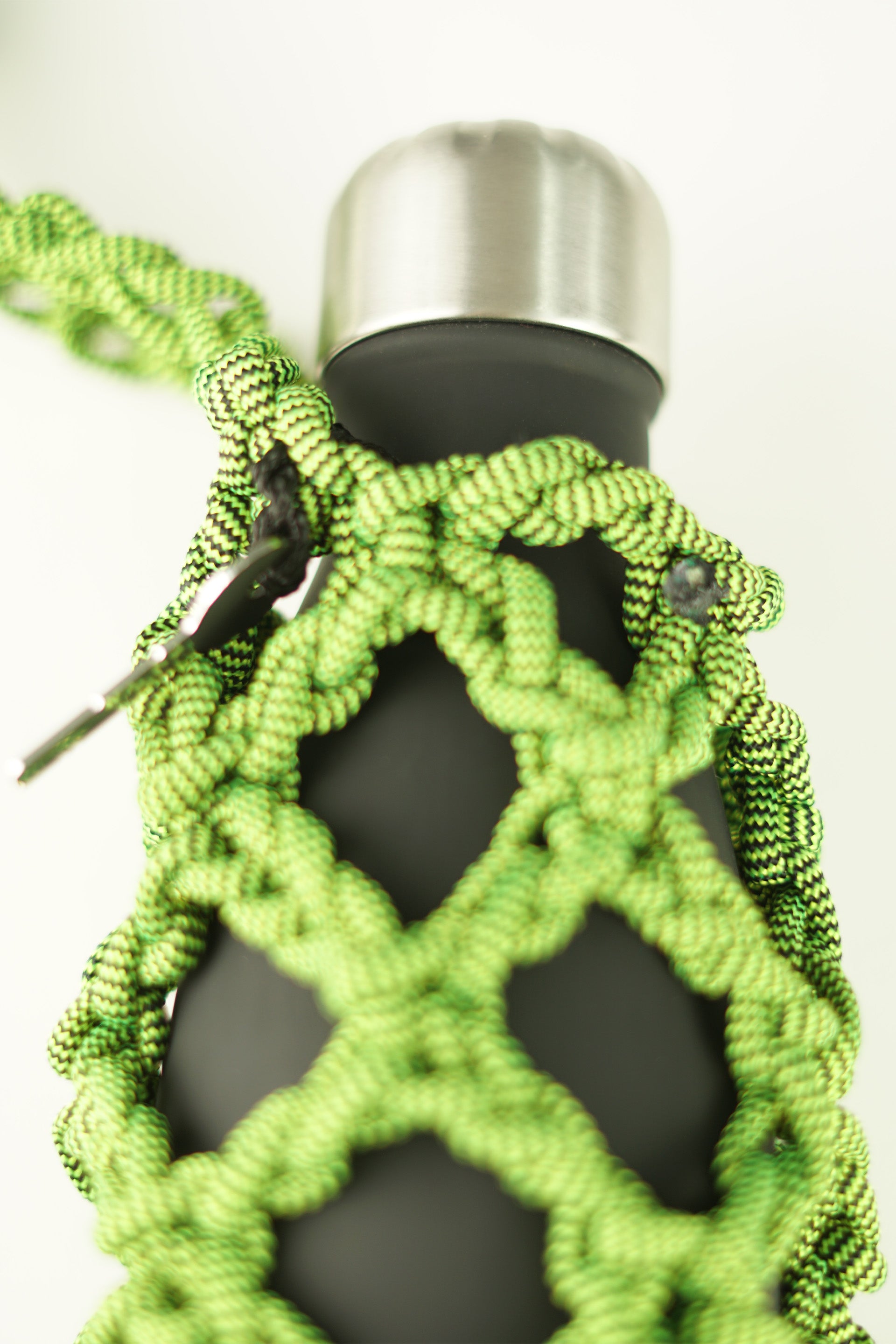 Green water porter made of paracord rope