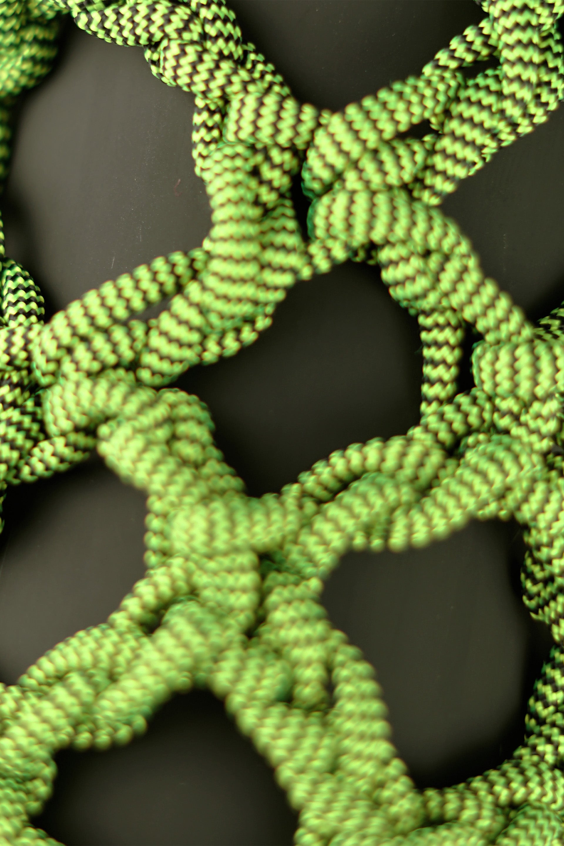 Green water porter made of paracord rope