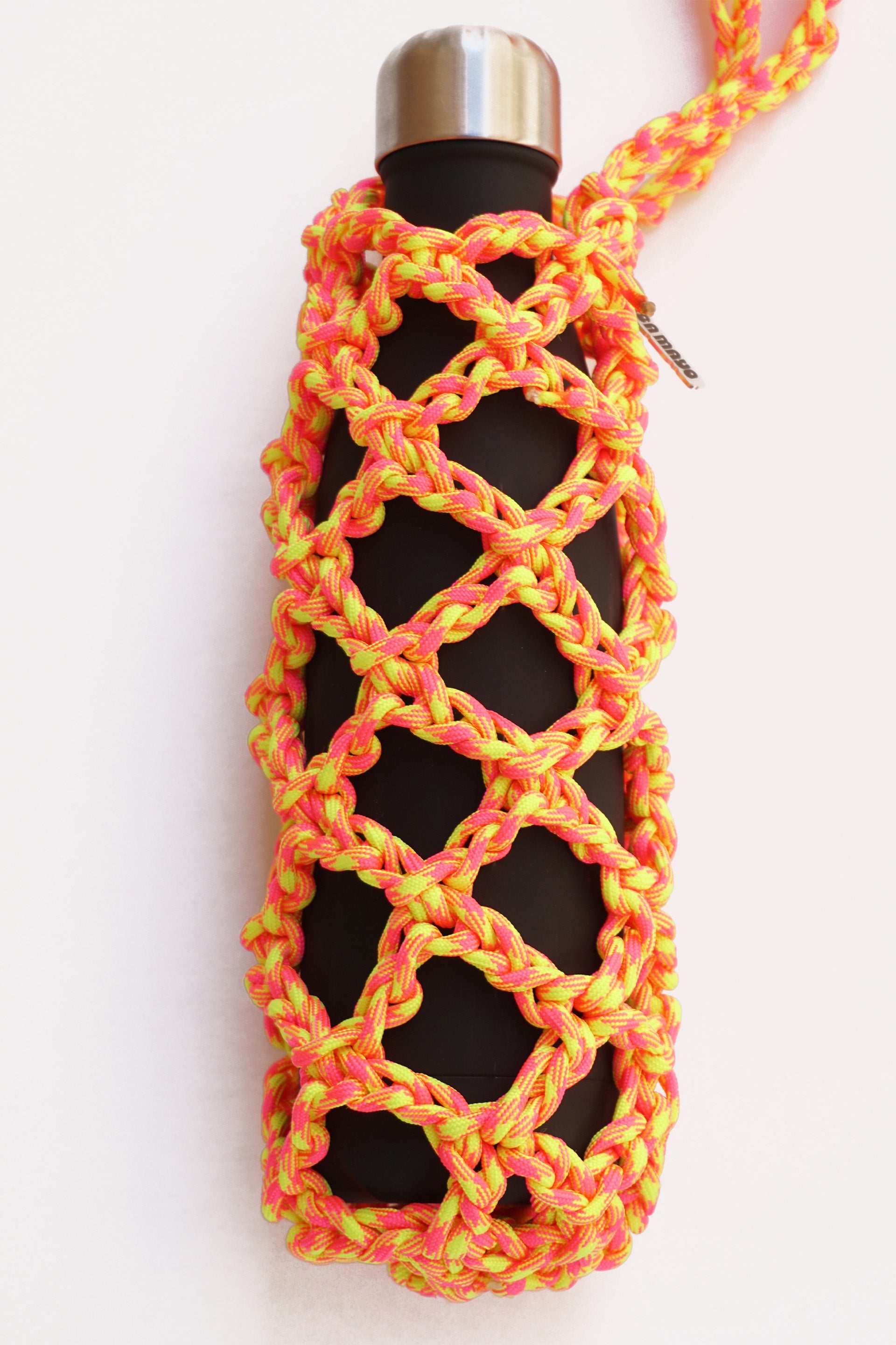 Yellow and pink water porter made of paracord rope