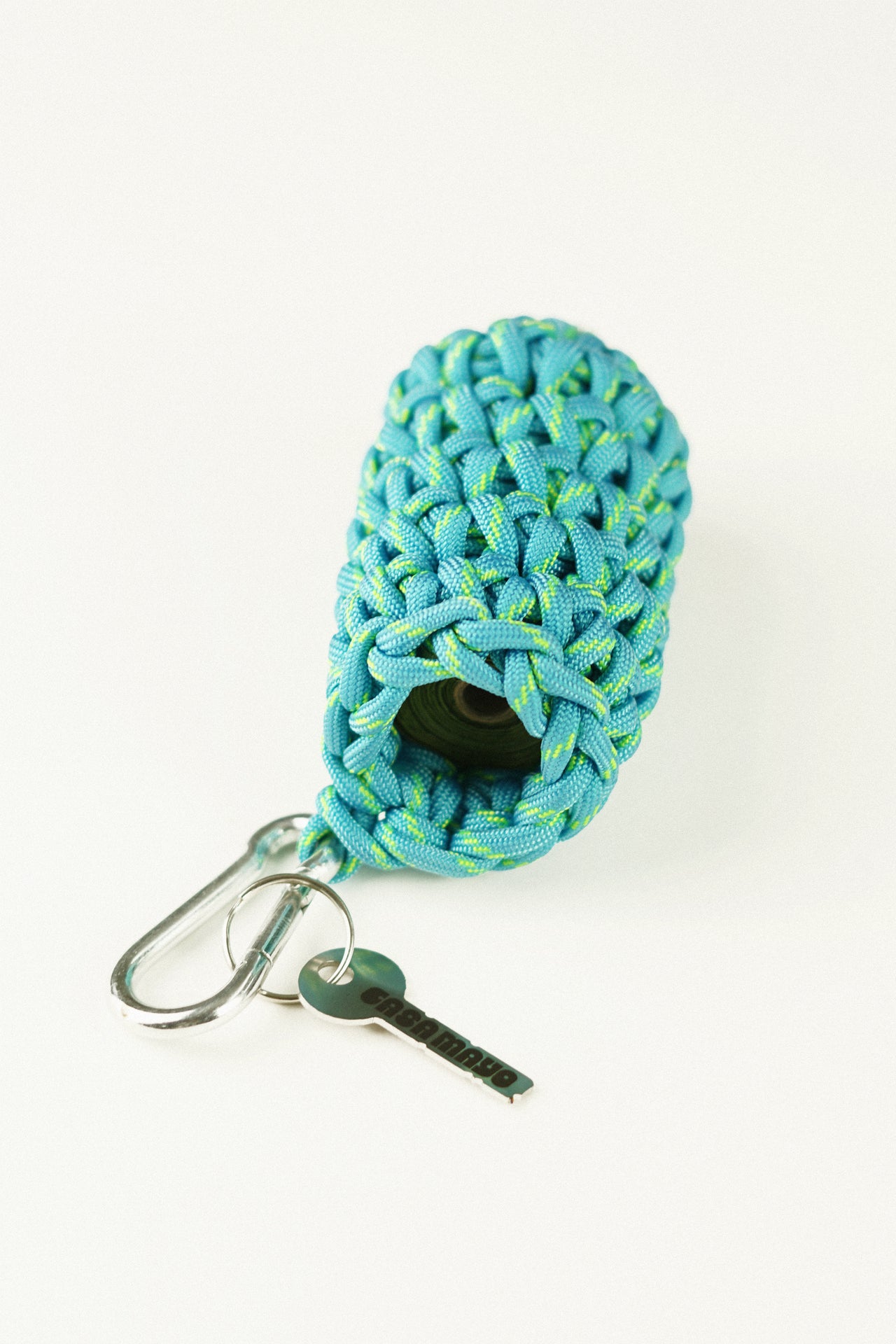 Blue and green pet bag holder made of paracord rope